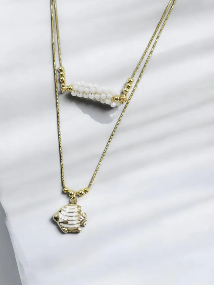 Collar Gusanito con dije pez dorado y cristales rondel
Collar doble femenino con detalles bañados en oro 18k
Collar moderno con pez dorado y diseño artesanal