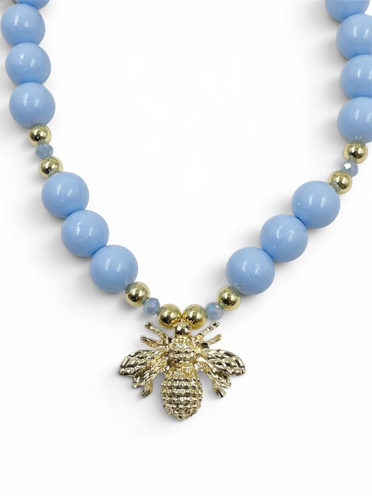 Collar Chunky Abeja Gold de bolas acrílicas doradas con separadores de cristal facetado y dije de abeja, diseño llamativo y moderno.