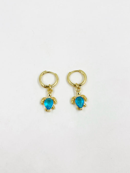 Aretes de rodinado con dije incrustado de gema cristal azul – Largo 2.8 cm