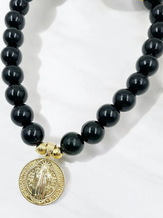 Collar Sello de Protección Maxi con medalla San Benito dorada
Choker ajustable con medalla San Benito y esferas de colores
Collar femenino de protección con detalles dorados