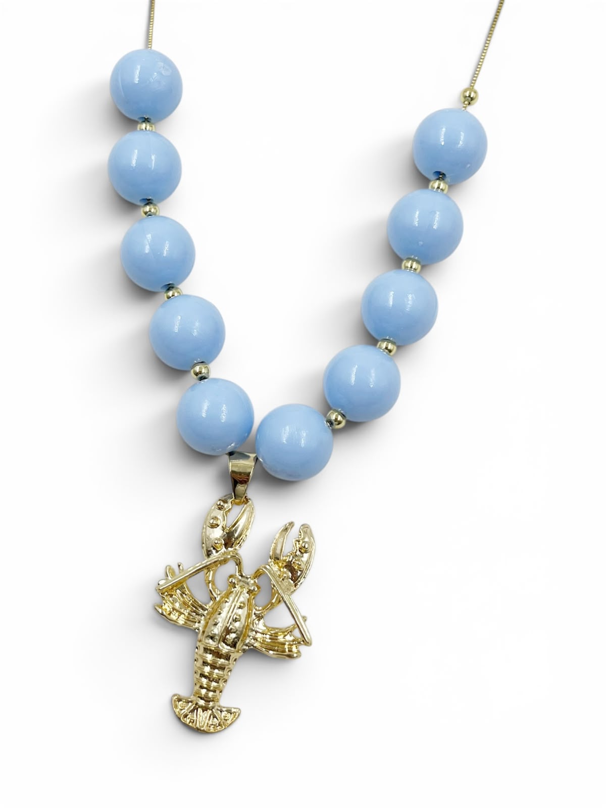 Collar Chunky de Langosta  con cuentas decorativas y dije de langosta inspirado en el océano.