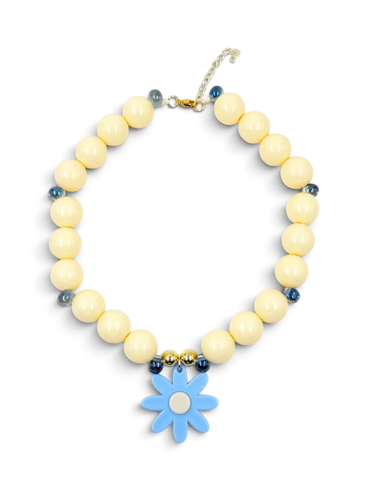 Collar chunky en tonos beige con detalles amarillos y dije de margarita, ideal para un estilo fresco y moderno.