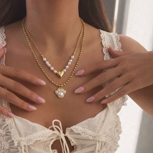 Collar Huella de Amor de dos cadenas con dijes de corazón y huella
