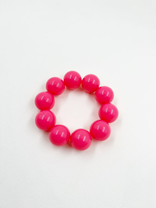 Pulsera artesanal en nylon elástico con esferas de resina brillante – Ajustable a la muñeca