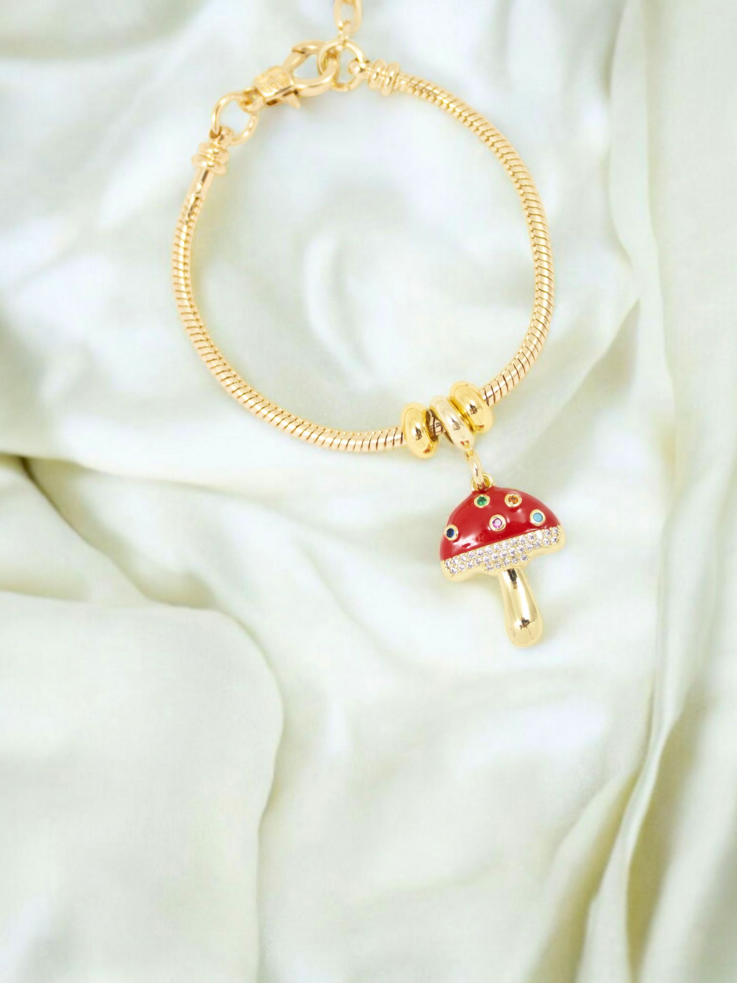 Pulsera Micelio Guaya Metálica rodinada con dije pintado y lacado