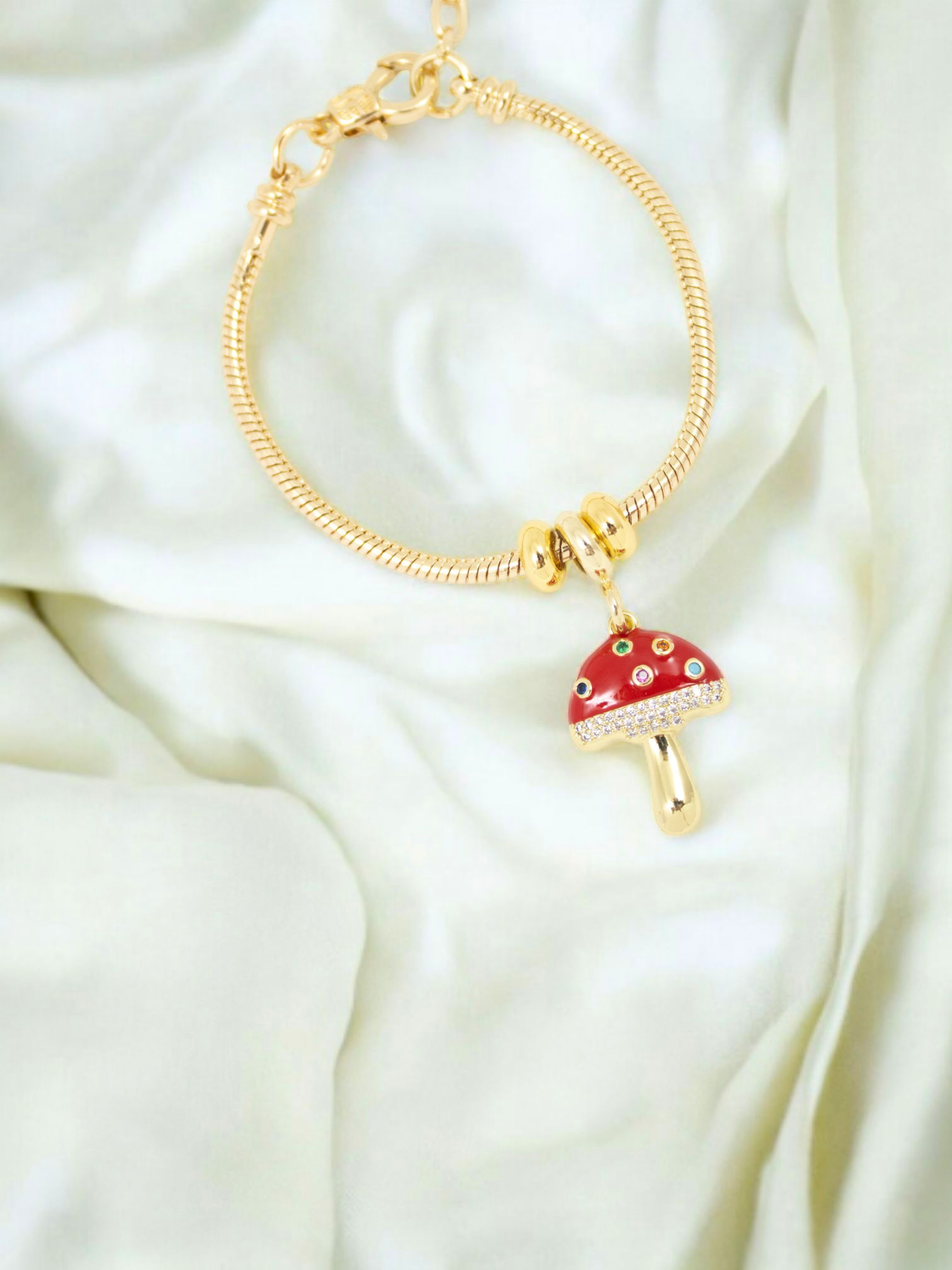 Pulsera Micelio Guaya Metálica rodinada con dije pintado y lacado