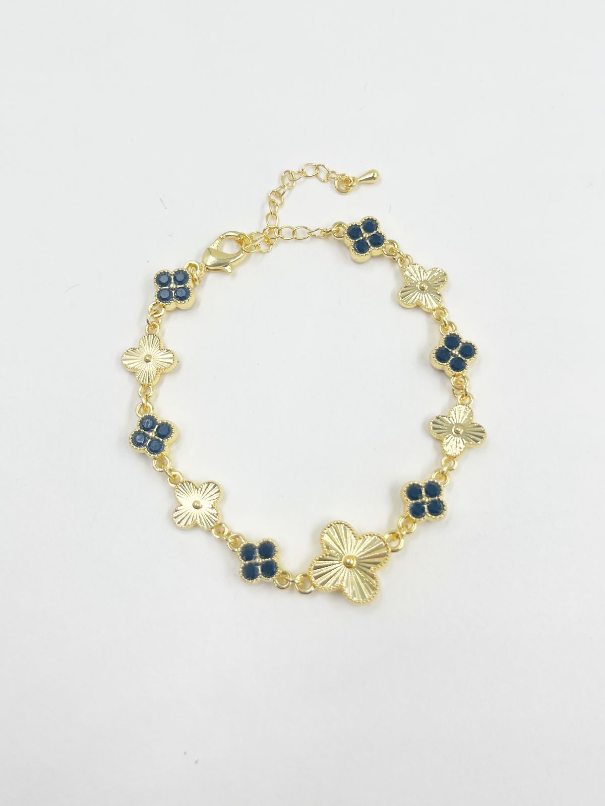 Pulsera en rodinado con incrustación de cristales en colores y tréboles dorados – Largo 17+5 cm