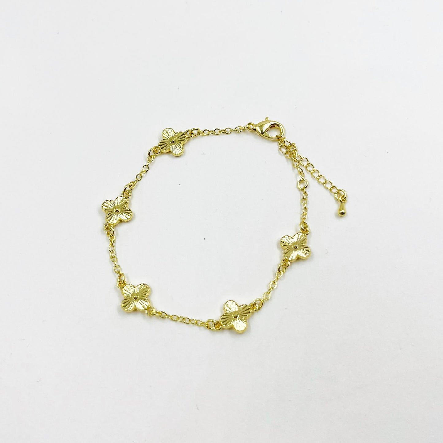 Pulsera Trébol en cadena rodinada con extensión ajustable y broche pico loro en rodio